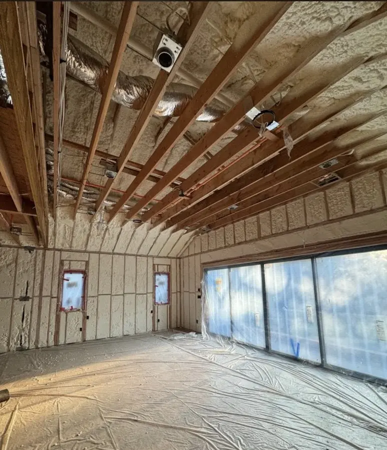 Interior walls and ceiling insulated with spray foam during new construction in Knoxville